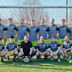 Rožnov pod Radhoštěm B 2021/22. Horní řada zleva Filip Sekyra, Tadeáš Svoboda, Petr Babiš, Tomáš Dvořák, Josef Šimek, Radek Pečiva, Radim Vokáč a Robert Blaško. Spodní řada zleva Martin Talpa, Václav Gajdušek, Jaroslav Juráň, Jan Kolář, Tomáš Tichý a Antonín Slovák.